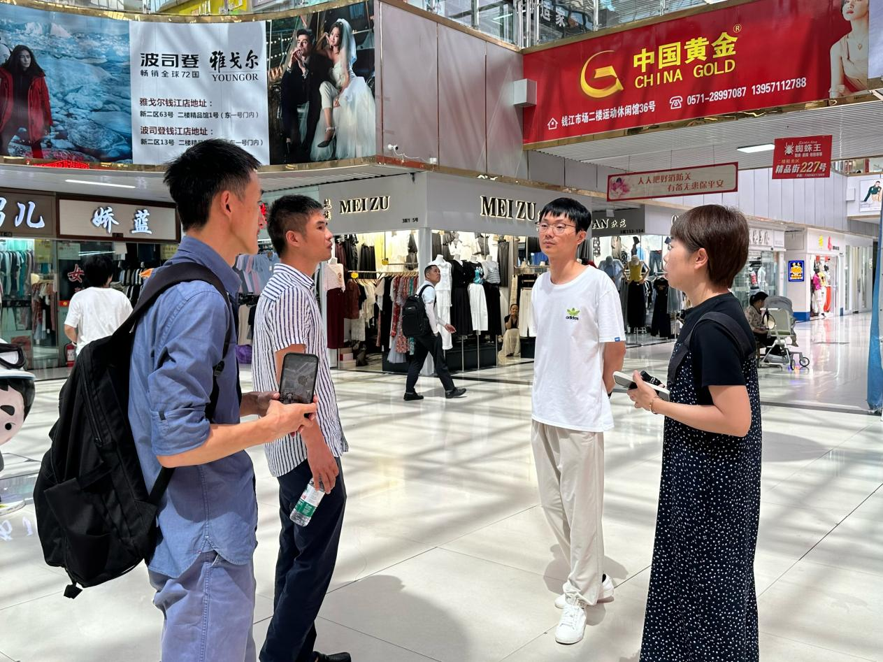 新昌羊毛衫兔毛市场一行赴钱江商城共探发展新路径